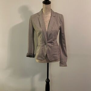 Maurices blazer grey in color size small.  Has should pads.